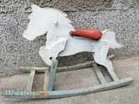 A toy rocking horse primitive from the beginning of the 20th century