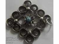 an old very beautiful silver pendant