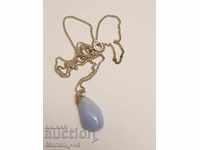 Silver chain with pendant of light blue chalcedony