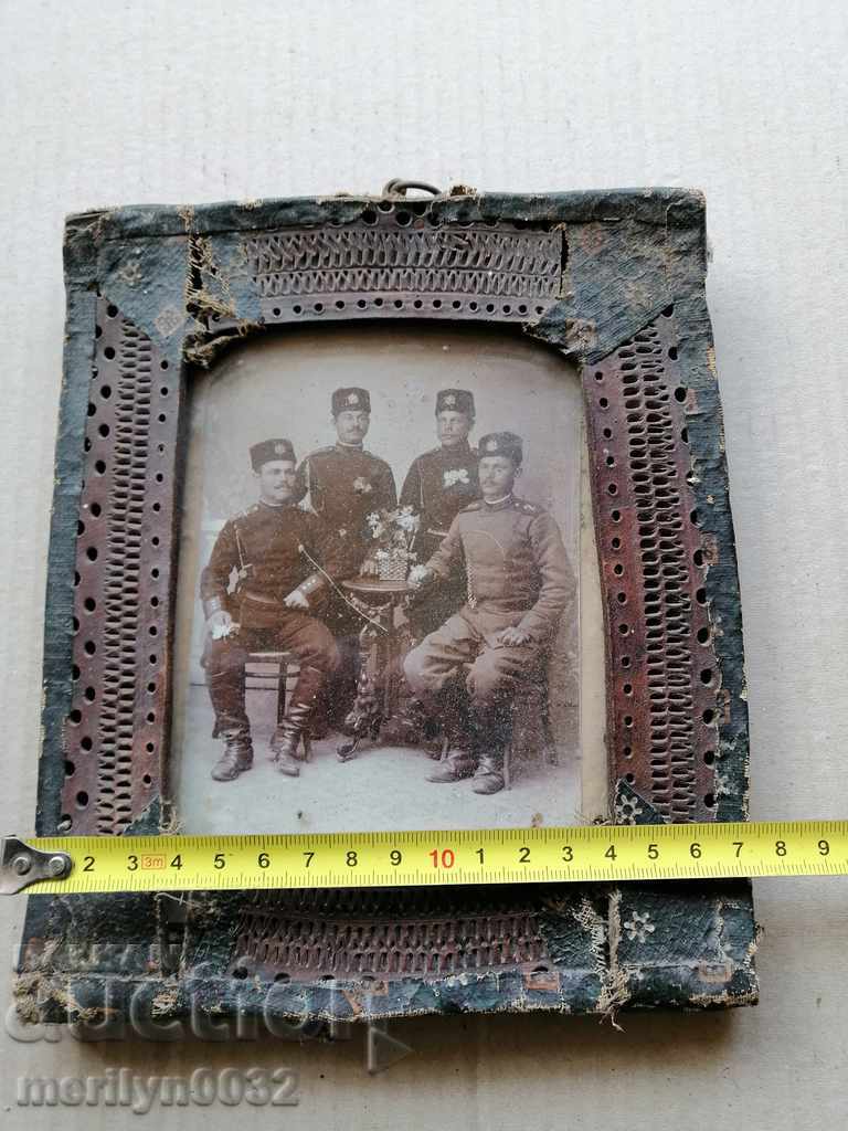 Delivery of Old portrait in frame with soldiers, picture photography Delivery of Old portrait in frame with soldiers, picture photography