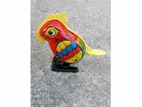 Детска ламаринена играчка папагал папагалче