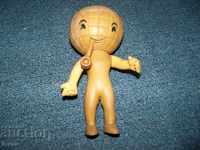 An old interesting rubber figurine on Smoking Earth