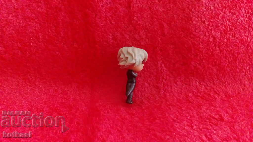 Auction  Small toy figure