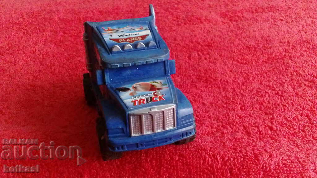 Delivery of Small plastic toy truck Delivery of Small plastic toy truck