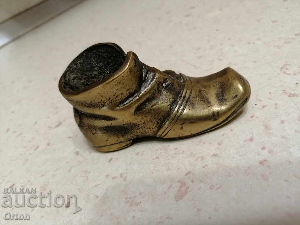 Old bronze shoe with price 35.00 BGN | € 17.90 Old bronze shoe with price 35.00 BGN | € 17.90