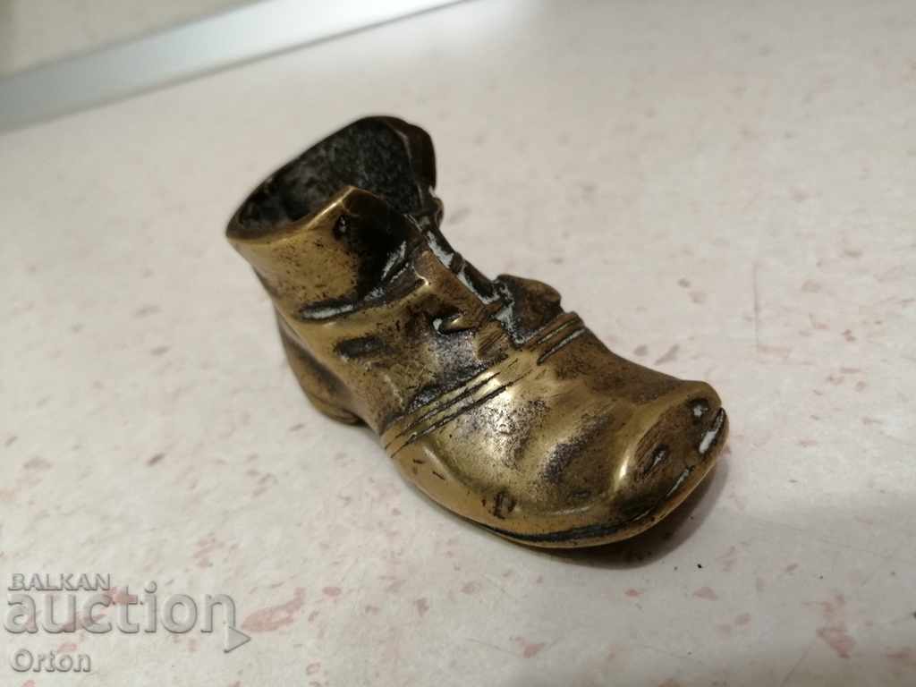 Old bronze shoe