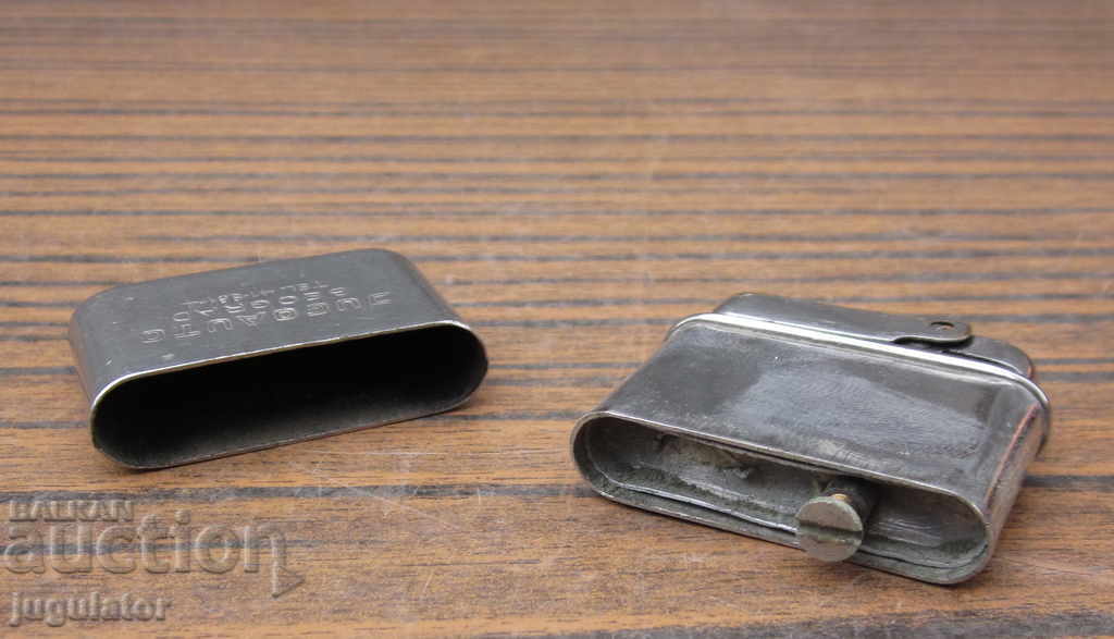 Delivery of an old gasoline lighter for cars stands JUGOAUTO Delivery of an old gasoline lighter for cars stands JUGOAUTO