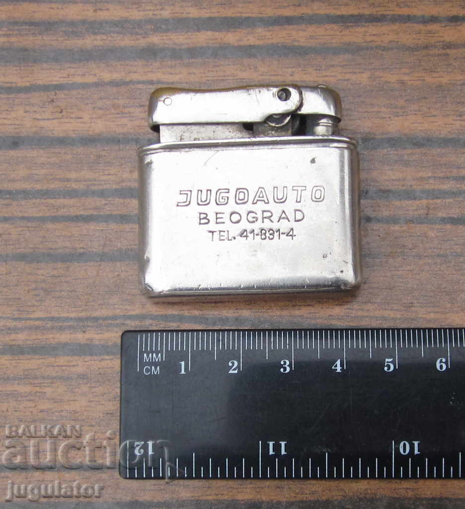 an old gasoline lighter for cars stands JUGOAUTO - 6 an old gasoline lighter for cars stands JUGOAUTO - 6