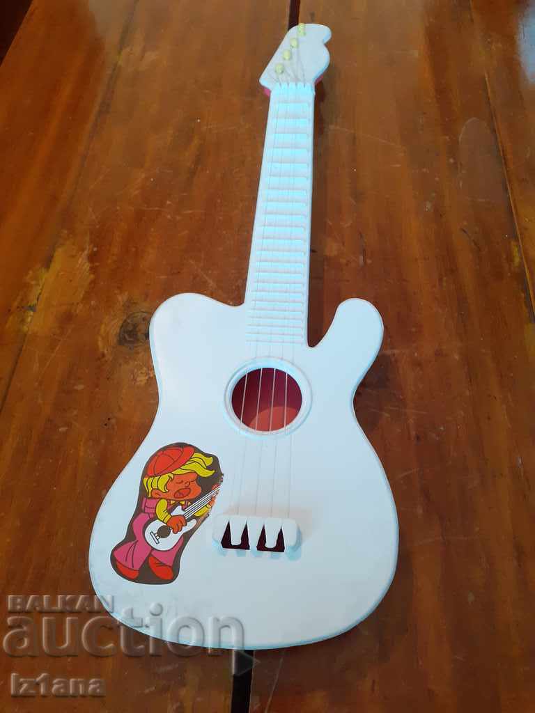 Old children's guitar with price 33.00 BGN | € 16.87