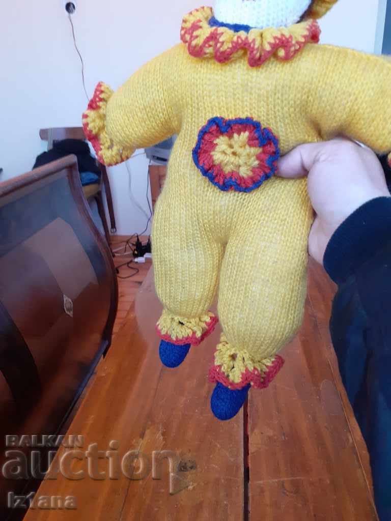 Delivery of Old knitted doll