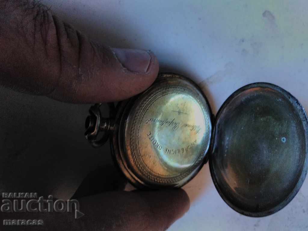 Auction  Silver pocket watch