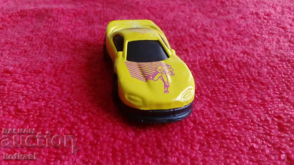 Delivery of Old small metal sports car Delivery of Old small metal sports car