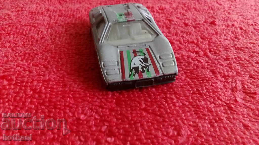 Delivery of Old small metal Lamborghini sports car Delivery of Old small metal Lamborghini sports car