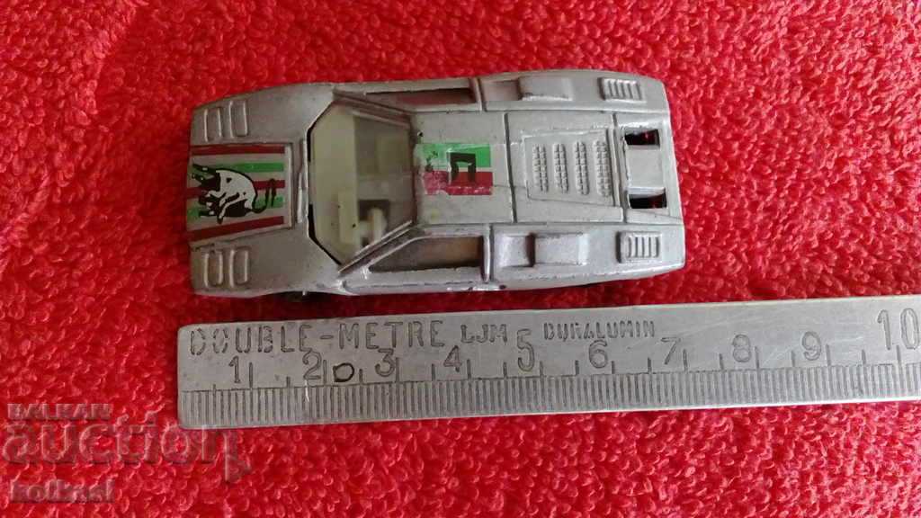 Old small metal Lamborghini sports car Old small metal Lamborghini sports car