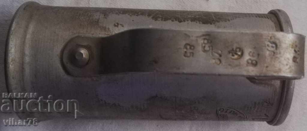 Auction An old measure of alcohol with stamps Auction An old measure of alcohol with stamps