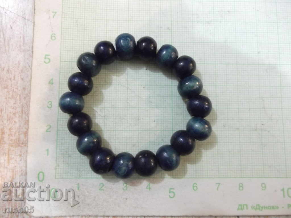 Auction  Extension bracelet made of wooden balls