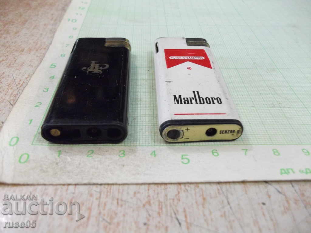 Lot of 2 gas (JSP and Marllbo) piezocrystalline lighters with price 5.00 BGN | € 2.56