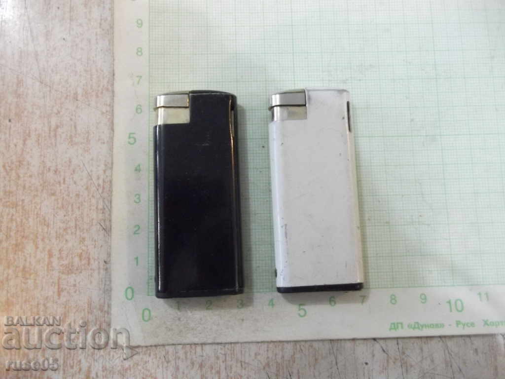 Auction  Lot of 2 gas (JSP and Marllbo) piezocrystalline lighters