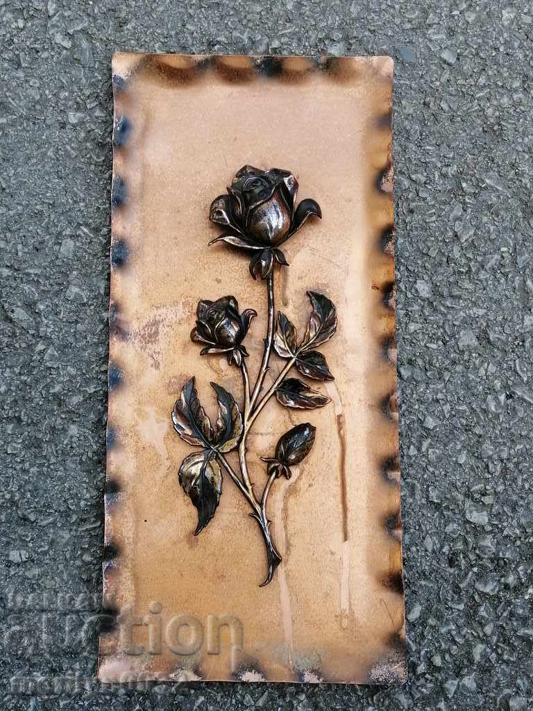 An antique copper wall panel