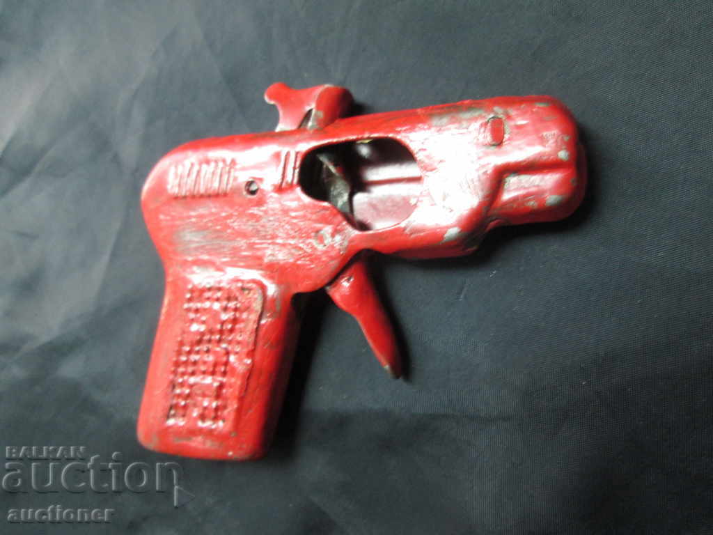 Auction  OLD METAL PLAYER TOY