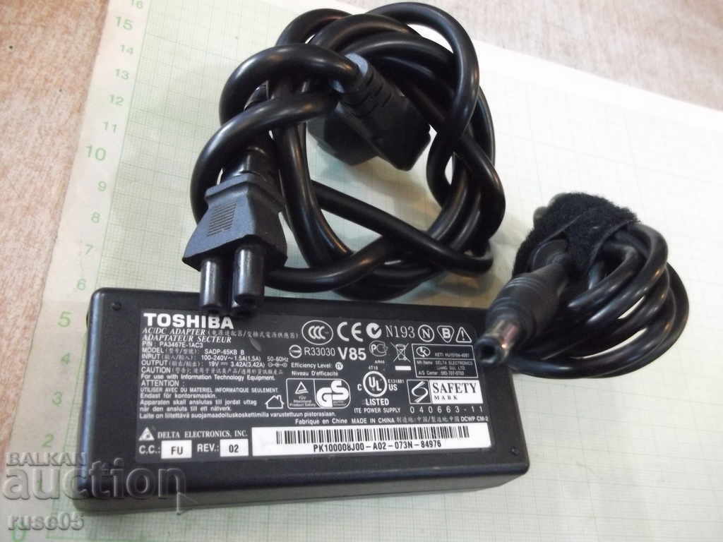 Auction Power supply "TOSHIBA - SADP - 65KB B" for laptop working Auction Power supply "TOSHIBA - SADP - 65KB B" for laptop working