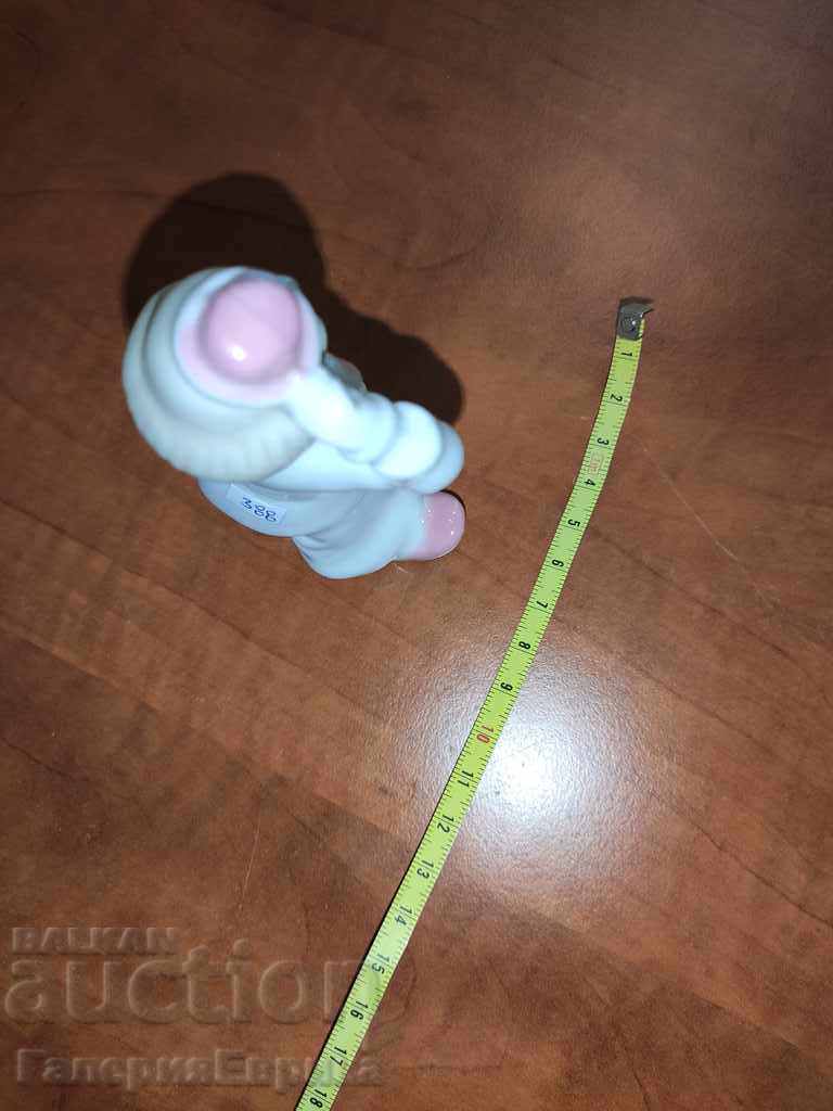 Auction Clown with porcelain clock Auction Clown with porcelain clock