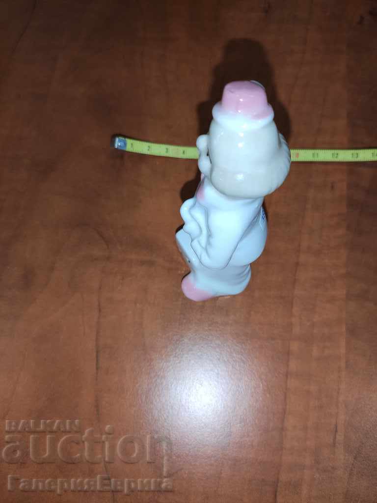 Delivery of Clown with porcelain clock Delivery of Clown with porcelain clock