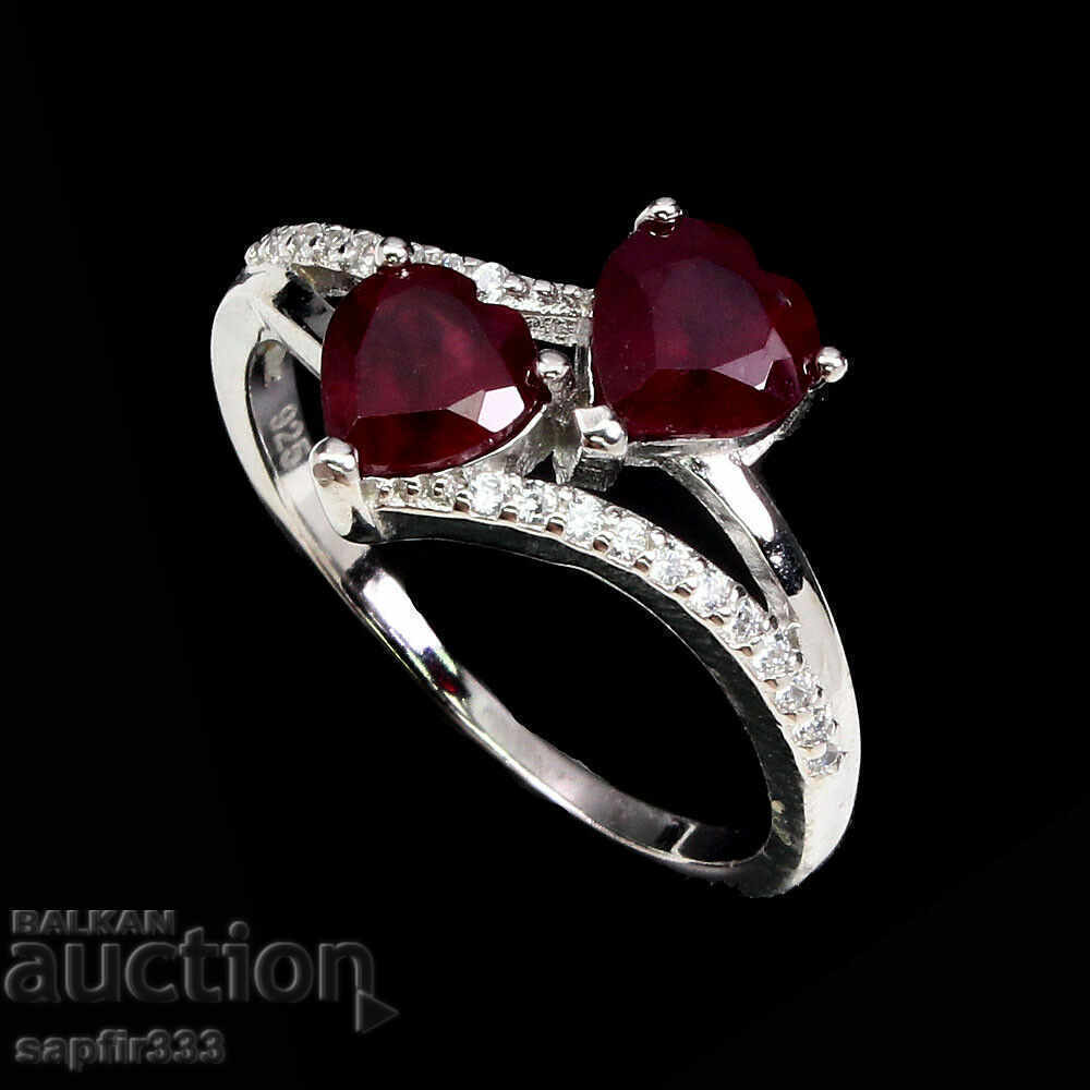 HEADS OF EXCELLENT DESIGNER RING WITH RUBY