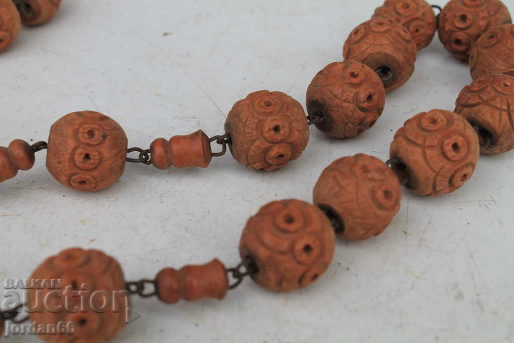 Auction  Old necklace made of wood