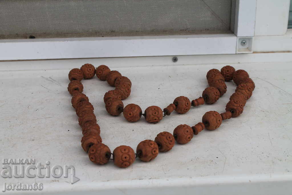 Old necklace made of wood