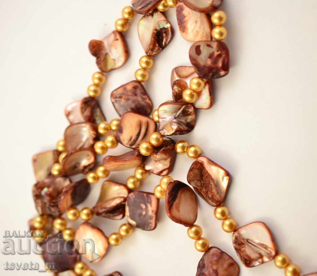 Long neck, mother of pearl with price 12.00 BGN | € 6.14 Long neck, mother of pearl with price 12.00 BGN | € 6.14