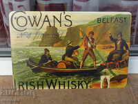 Metal plate Irish whiskey aged Belfast Cowan's