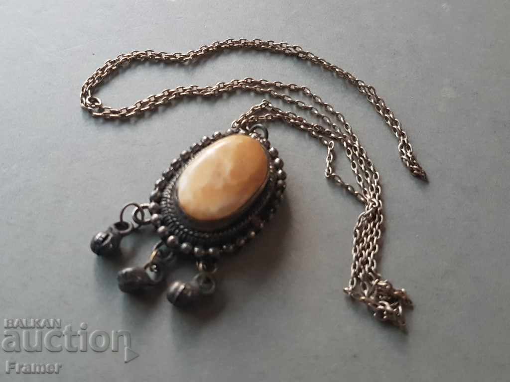 Old silver silver medallion with bone ornament with price 70.00 BGN | € 35.79