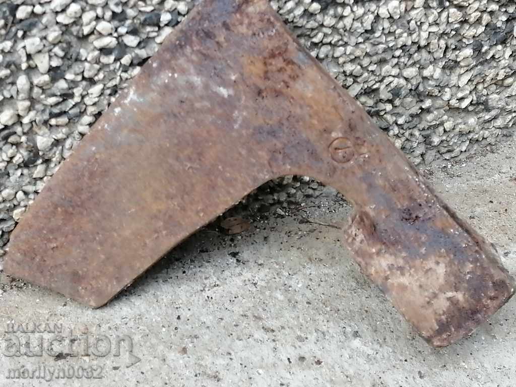 An old ax shaft tool wrought iron