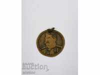 Un medalion de colecție vechi din bronz cu Stalin
