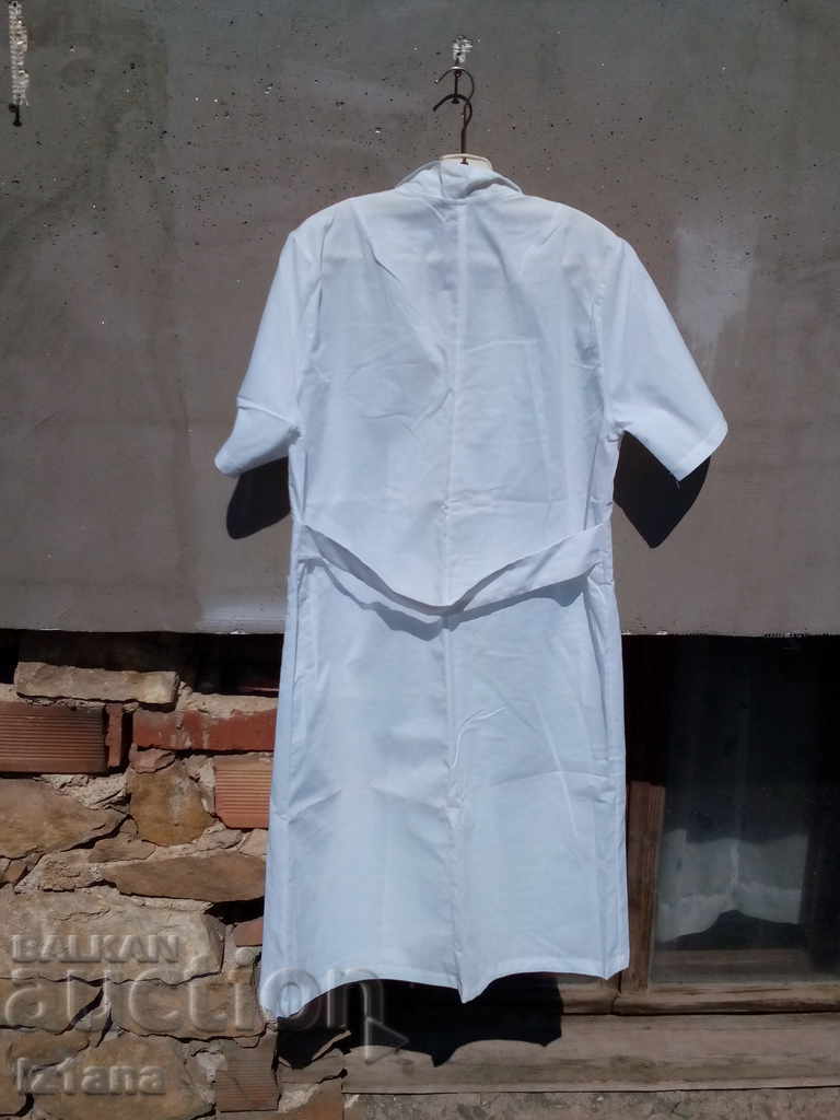 Livrarea Șorțul vechi de lucru alb