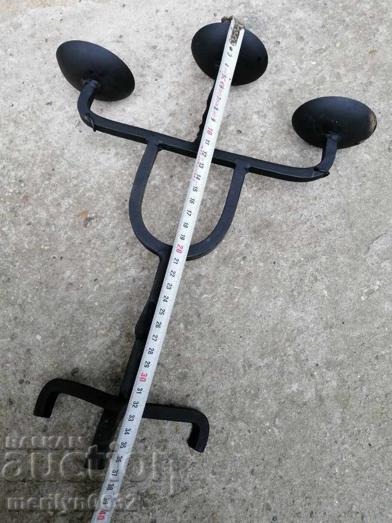 Auction Old forged candlestick, candle, candelabra Auction Old forged candlestick, candle, candelabra