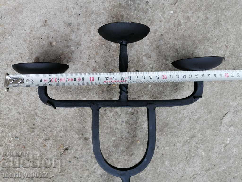 Delivery of Old forged candlestick, candle, candelabra Delivery of Old forged candlestick, candle, candelabra