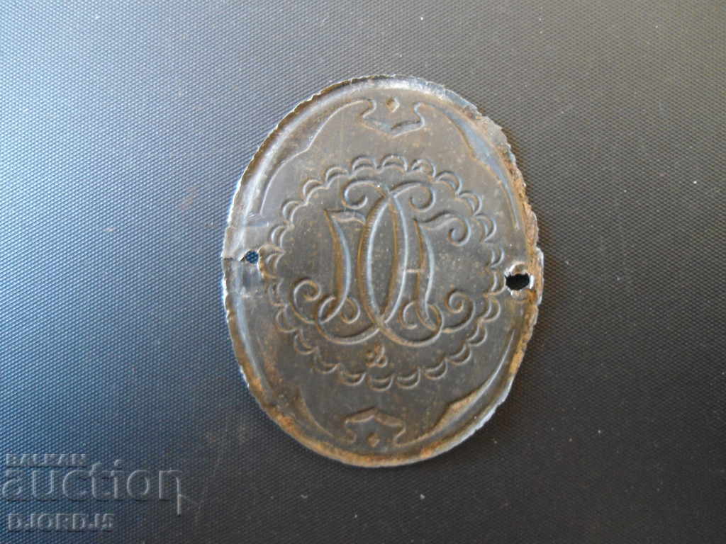 Auction Emblem of an old sewing machine Auction Emblem of an old sewing machine