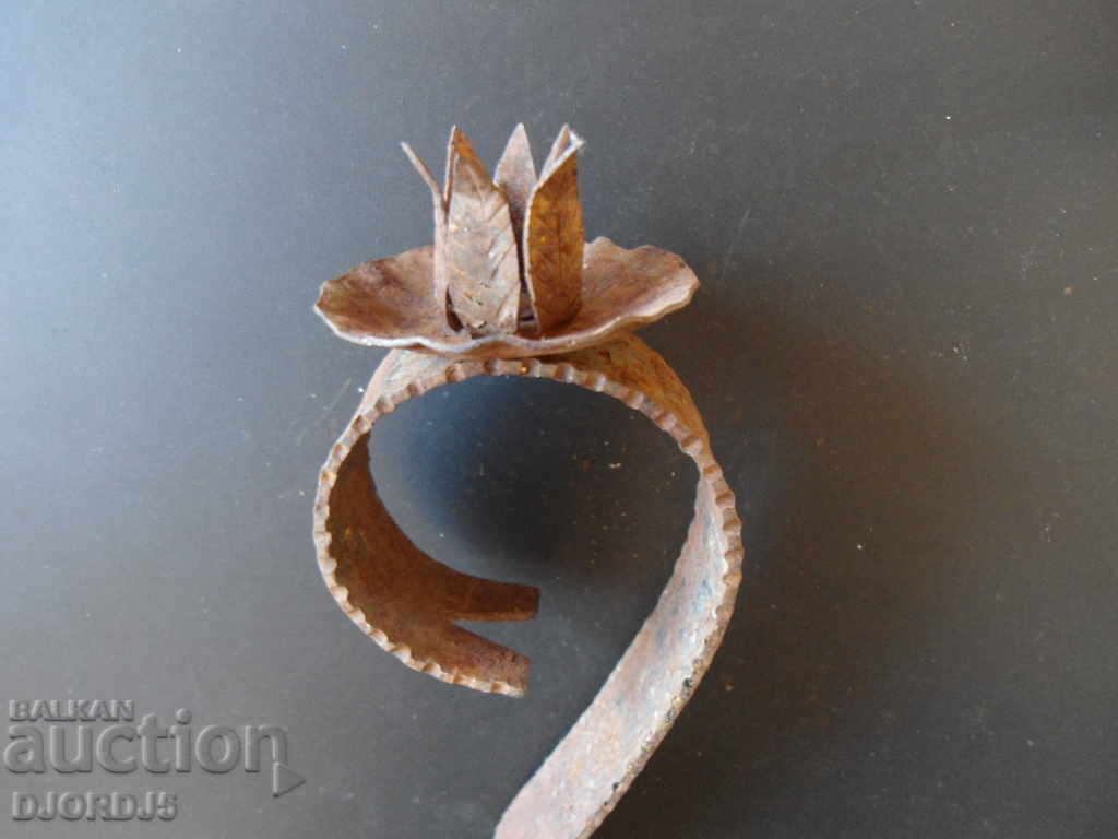 Delivery of Old forged metal candlestick Delivery of Old forged metal candlestick