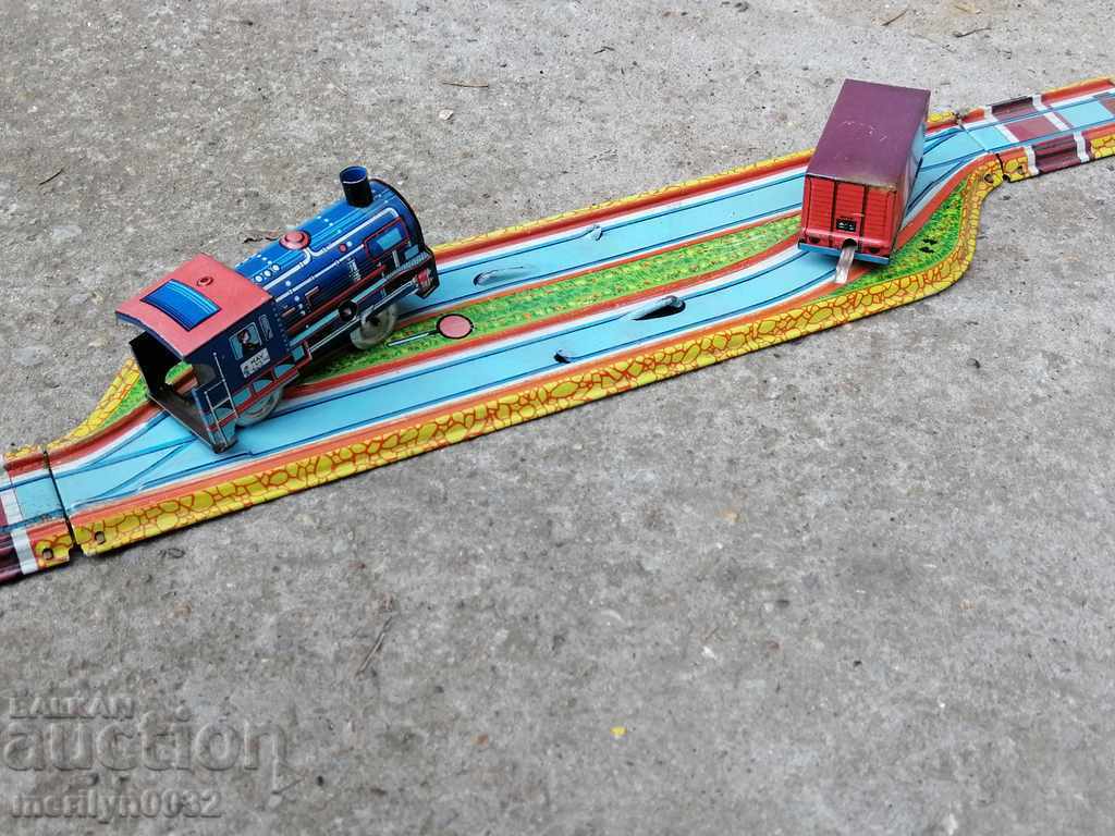 Delivery of Children's tin toy locomotive wagon rails train roller coaster Delivery of Children's tin toy locomotive wagon rails train roller coaster