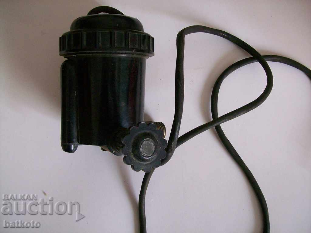 An old, fast-heating electric fountain soda utensil