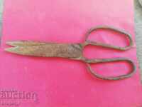 A very old pair of scissors