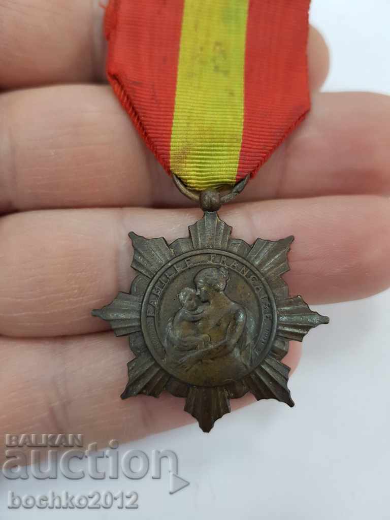 Collectible old French medal with ribbon