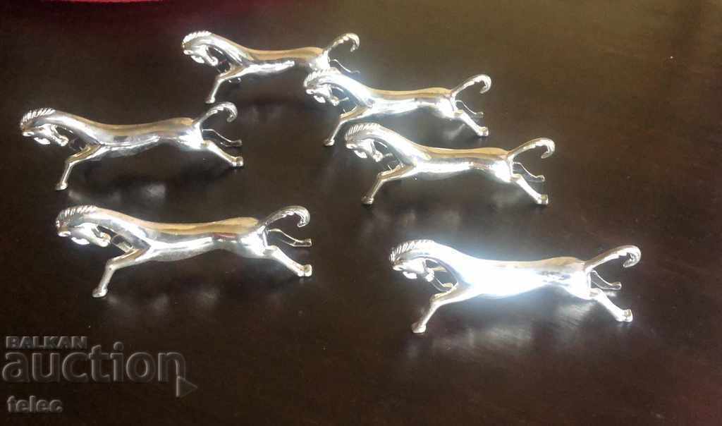 Delivery of Brand new set of silver plated cutlery holders - horses Delivery of Brand new set of silver plated cutlery holders - horses