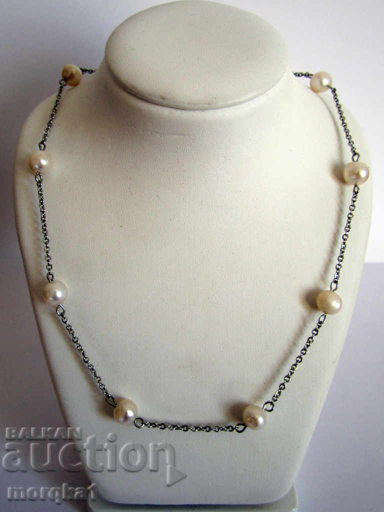 Gentle necklace with natural river pearls and medical steel