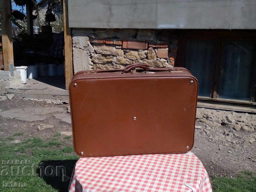 Auction An old suitcase Auction An old suitcase