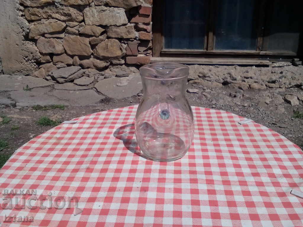 Delivery of Old glass jug