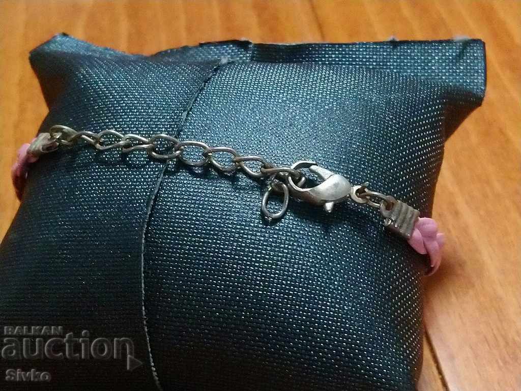 Metal hryvnia, stones, pink leather, children's with price 0.89 BGN | € 0.46 Metal hryvnia, stones, pink leather, children's with price 0.89 BGN | € 0.46