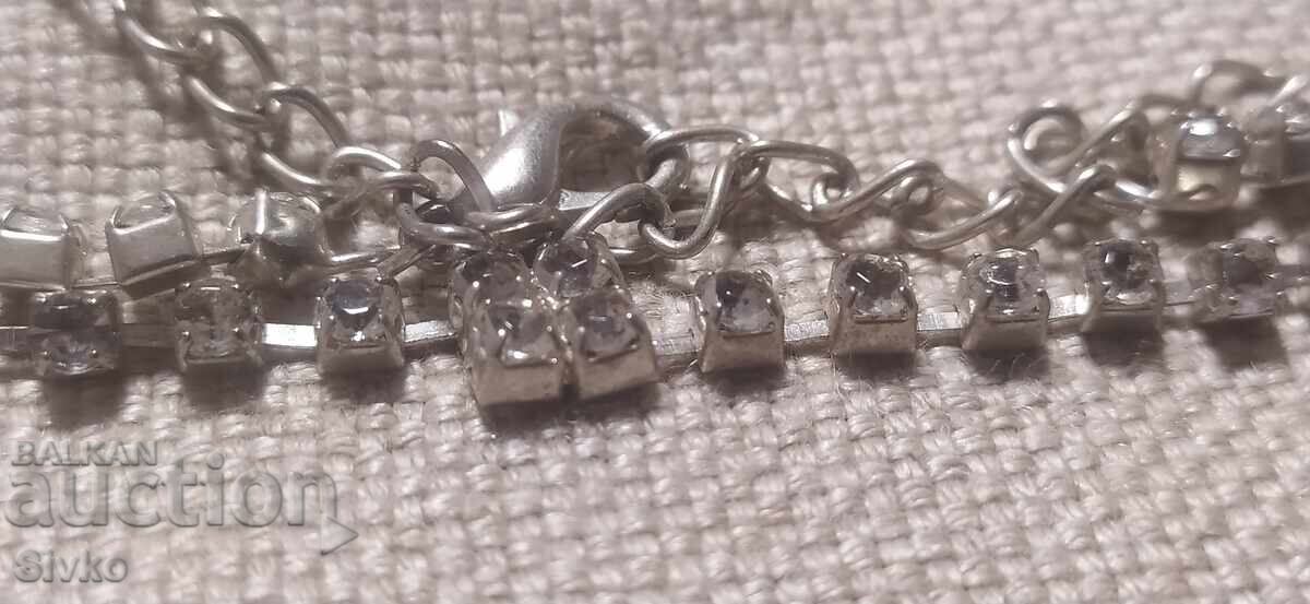 Delivery of Silver ring with zircons